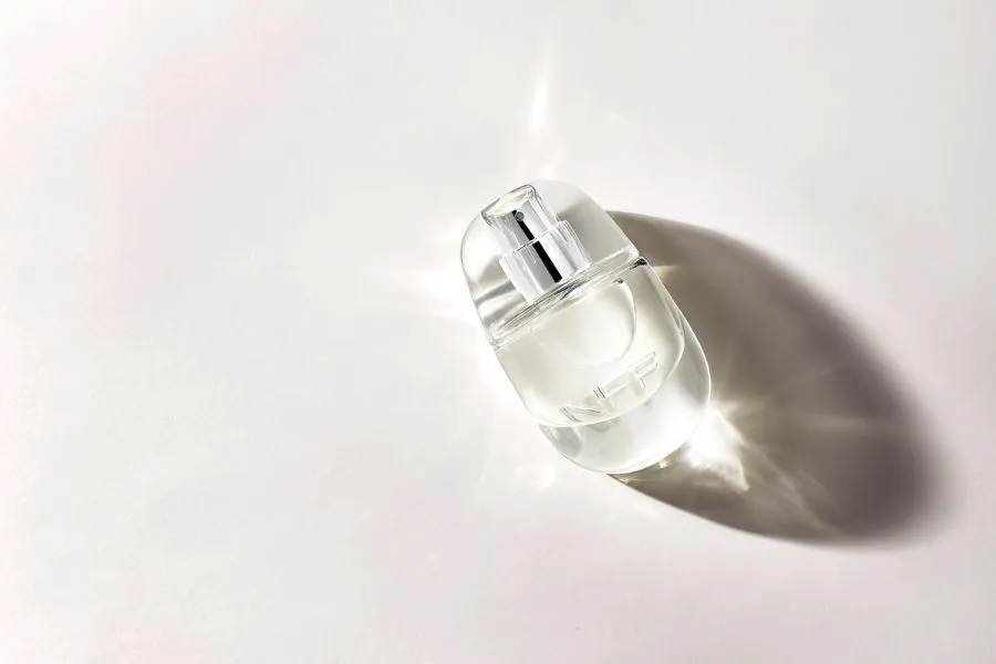 fragrance container reflecting in the sun